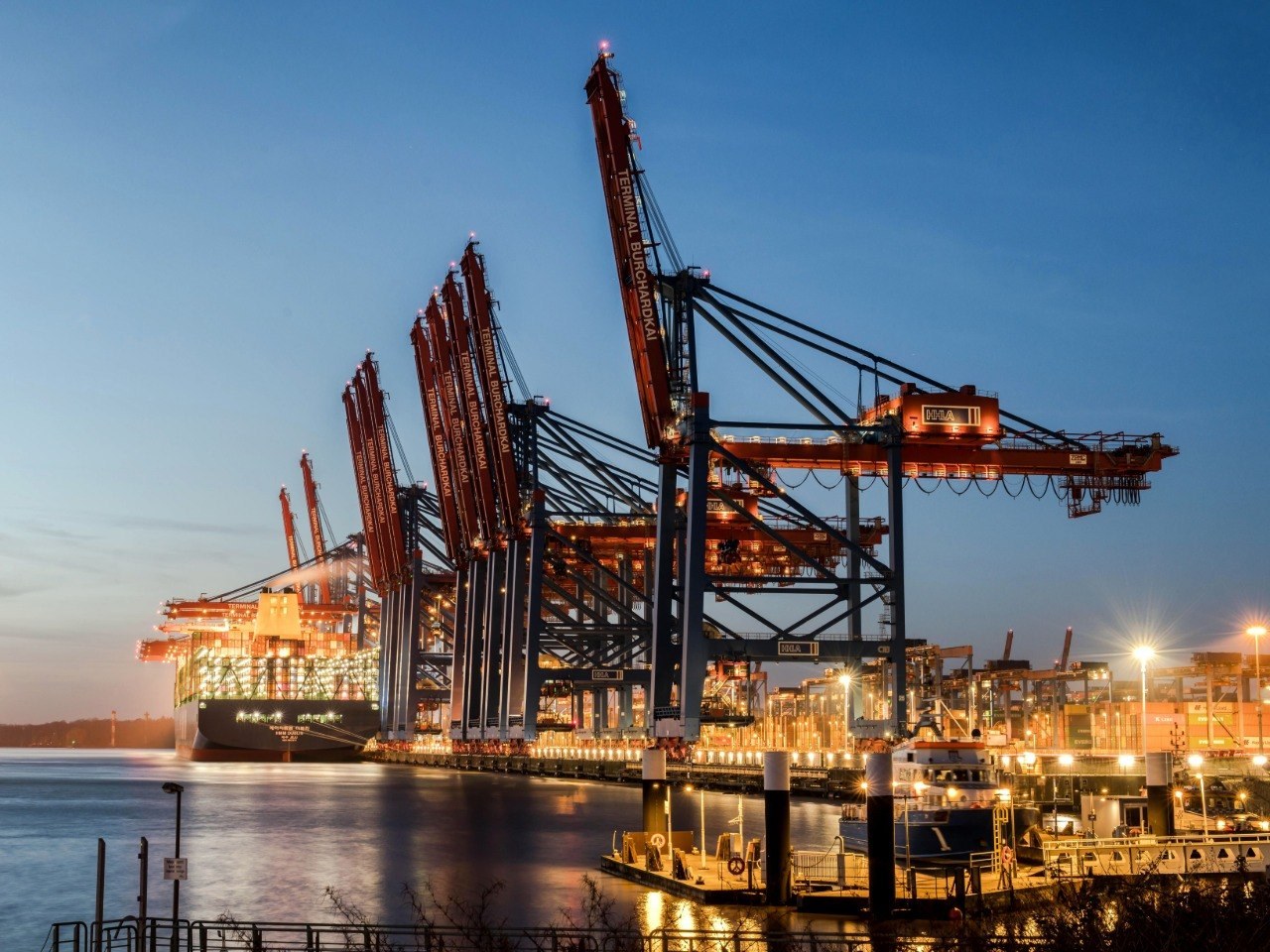 Real freight forwarding scene with container truck and shipping containers